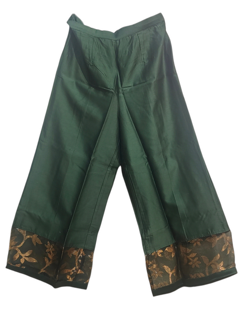 Green plazzo part with floral embroidery on a white background