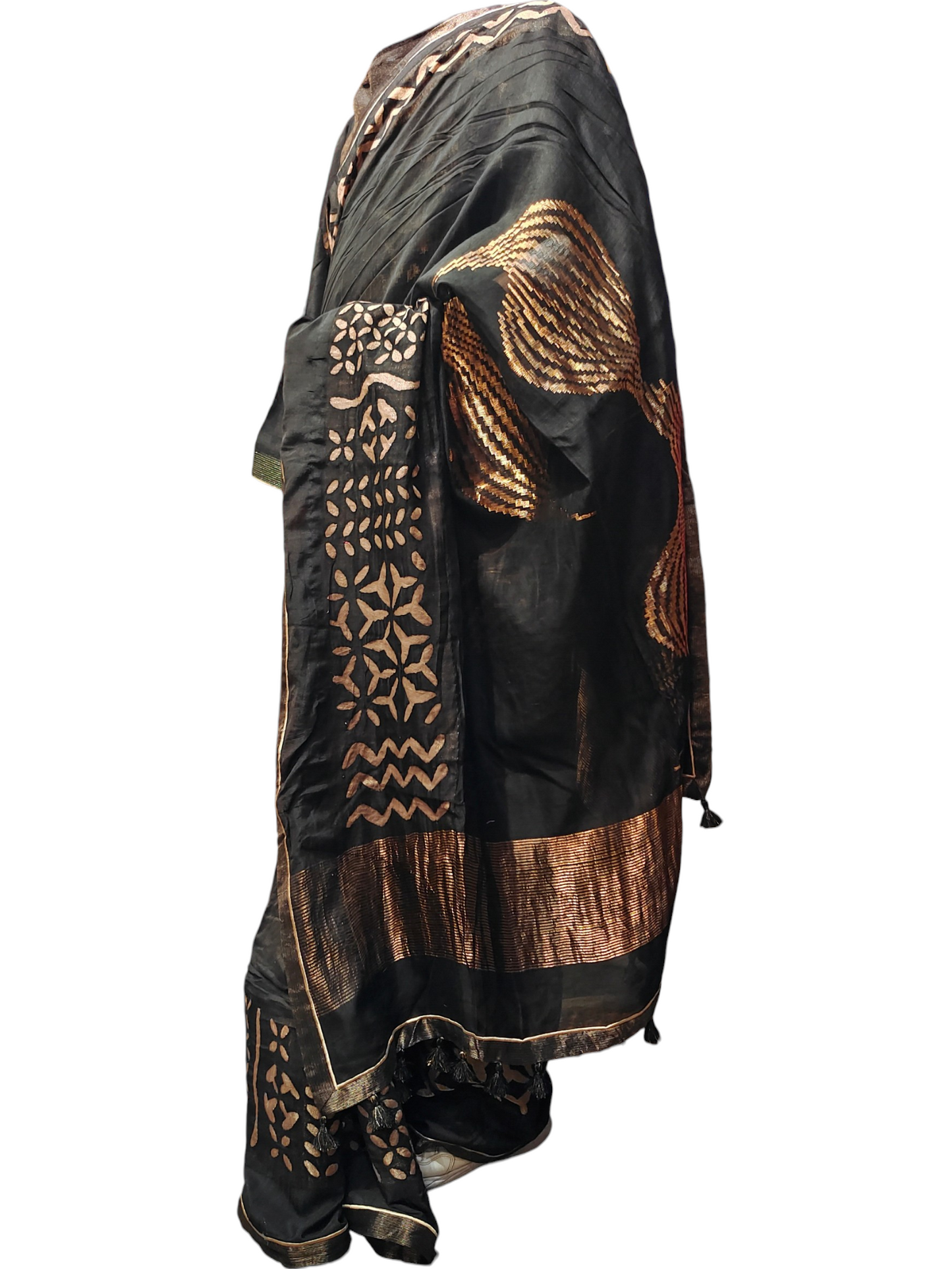 Black and gold patterned saree on a white background