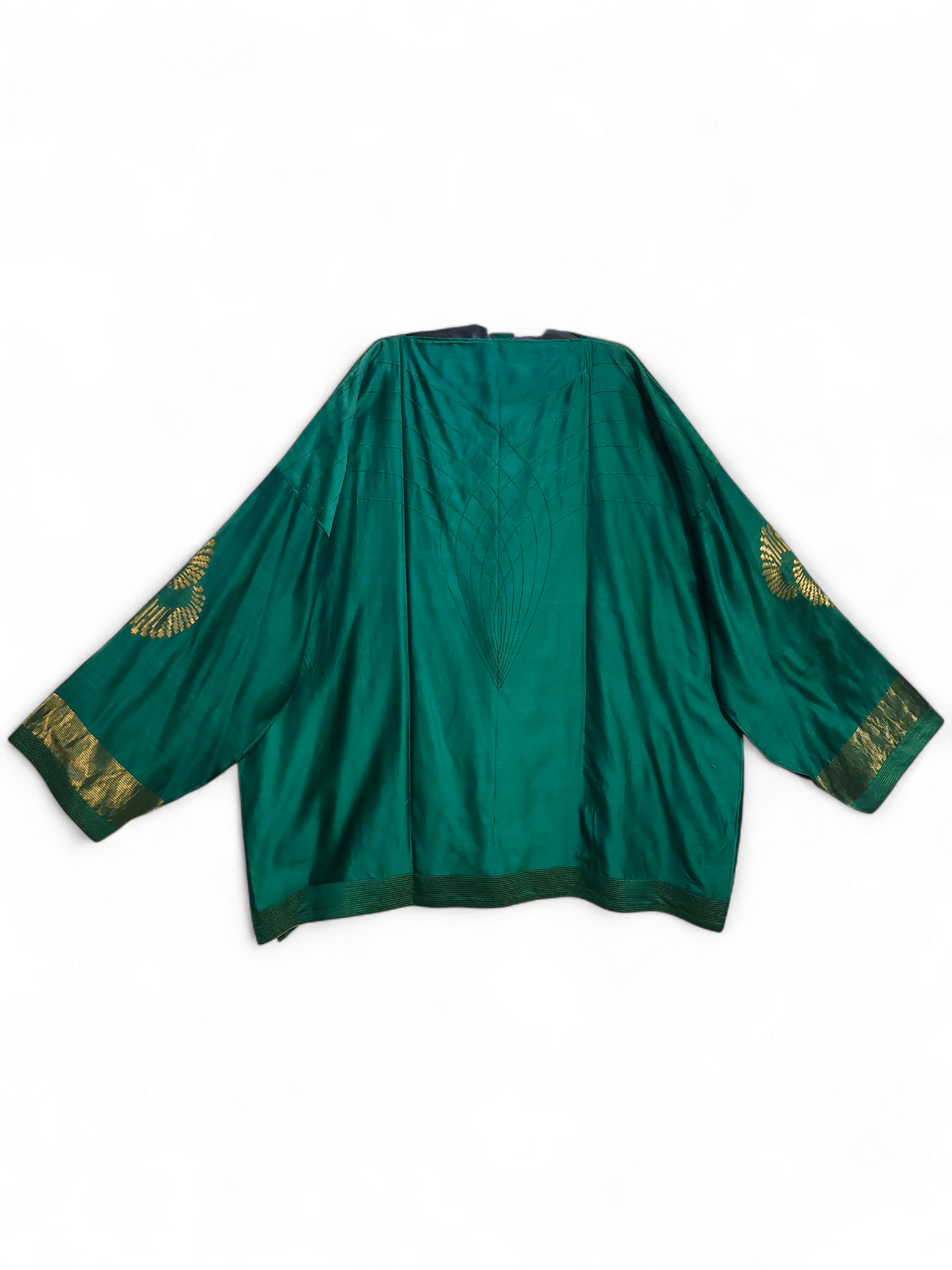 Green garment with gold embroidery on a white background