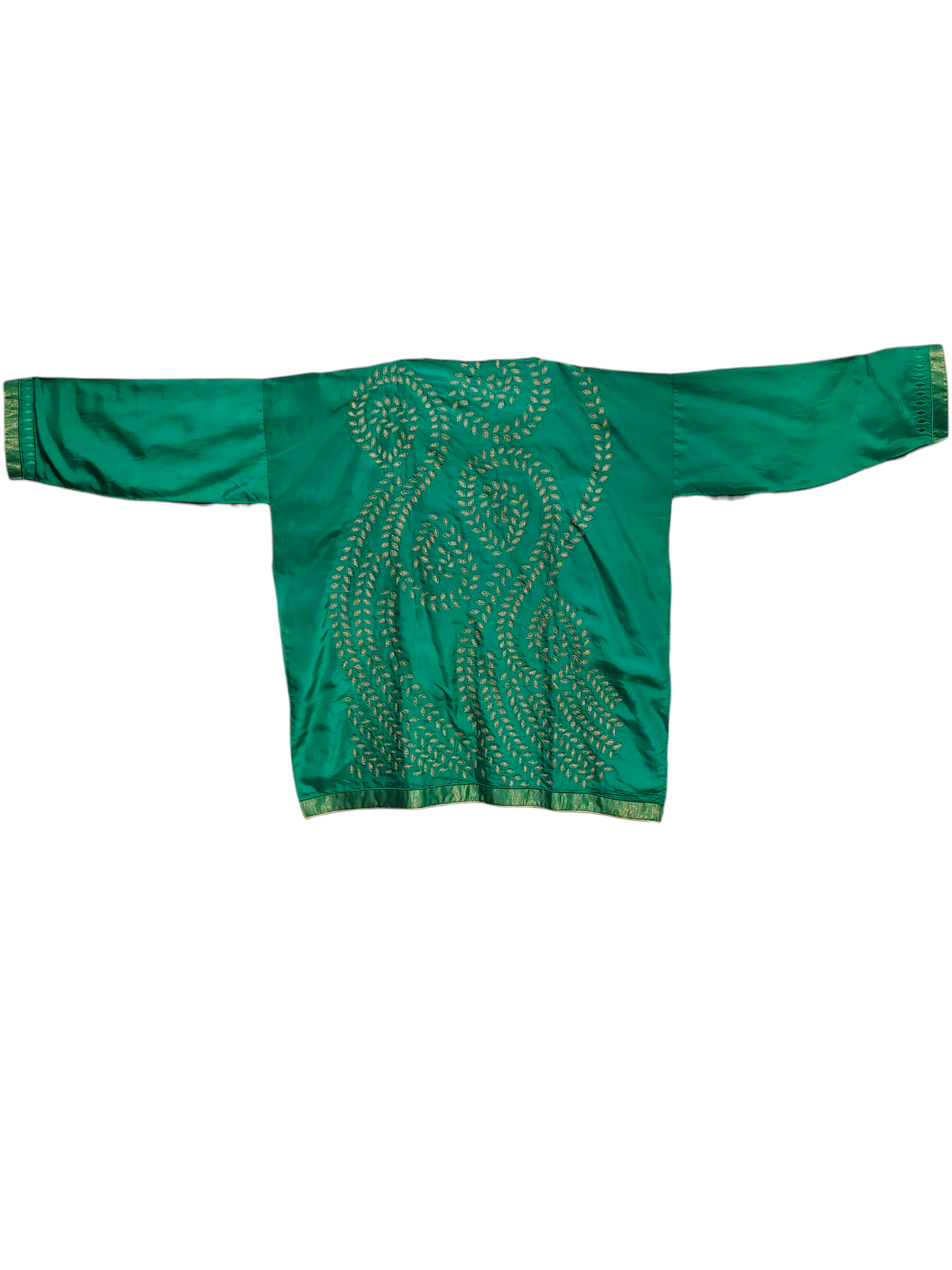 Green tunic and agold patterns on a white background 