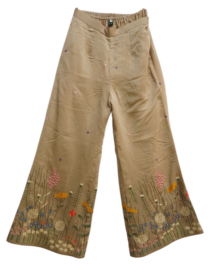 Beige pants with floral embroidery on a white background
