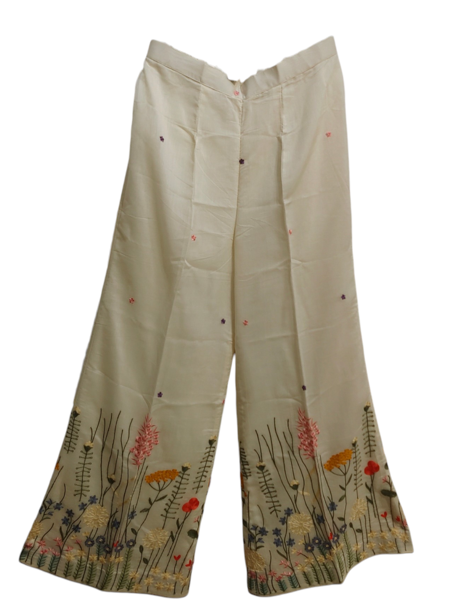 Beige plazzo with floral embroidery on a white background