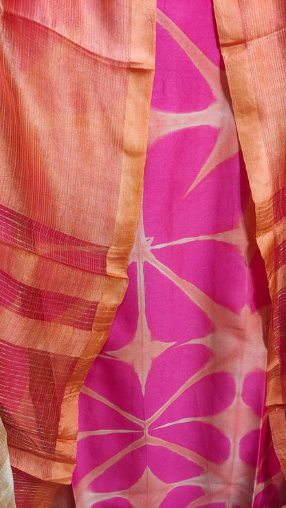 Close-up of a fabric with pink and orange pattern