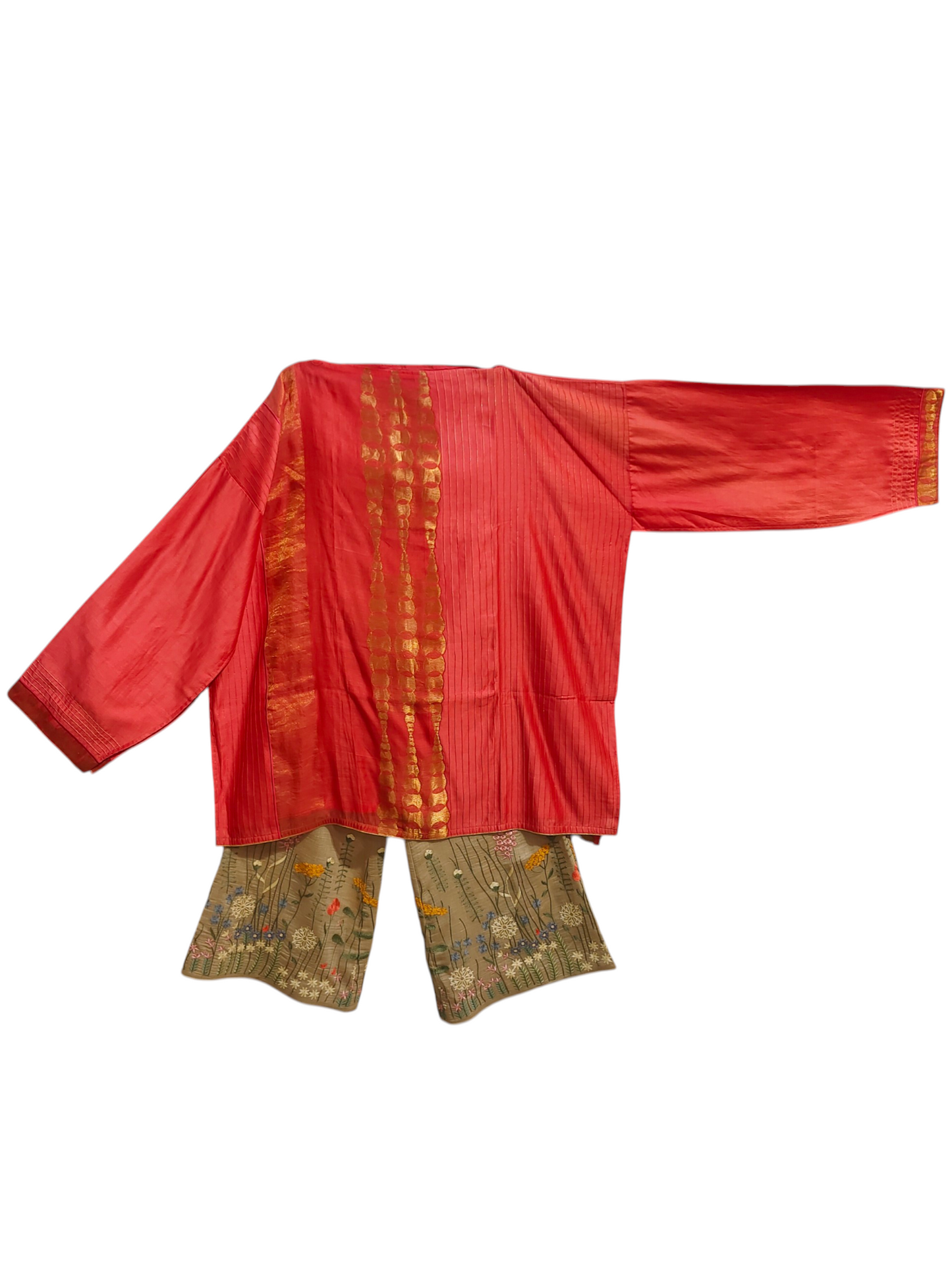 Pink traditional top with gold patterns on a white background