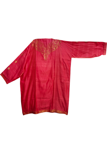 Pink kurta with gold embroidery on a white background