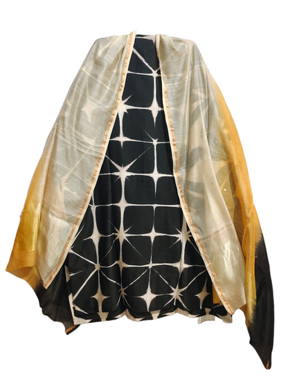 Black and white patterned kurta with gold border on a white background