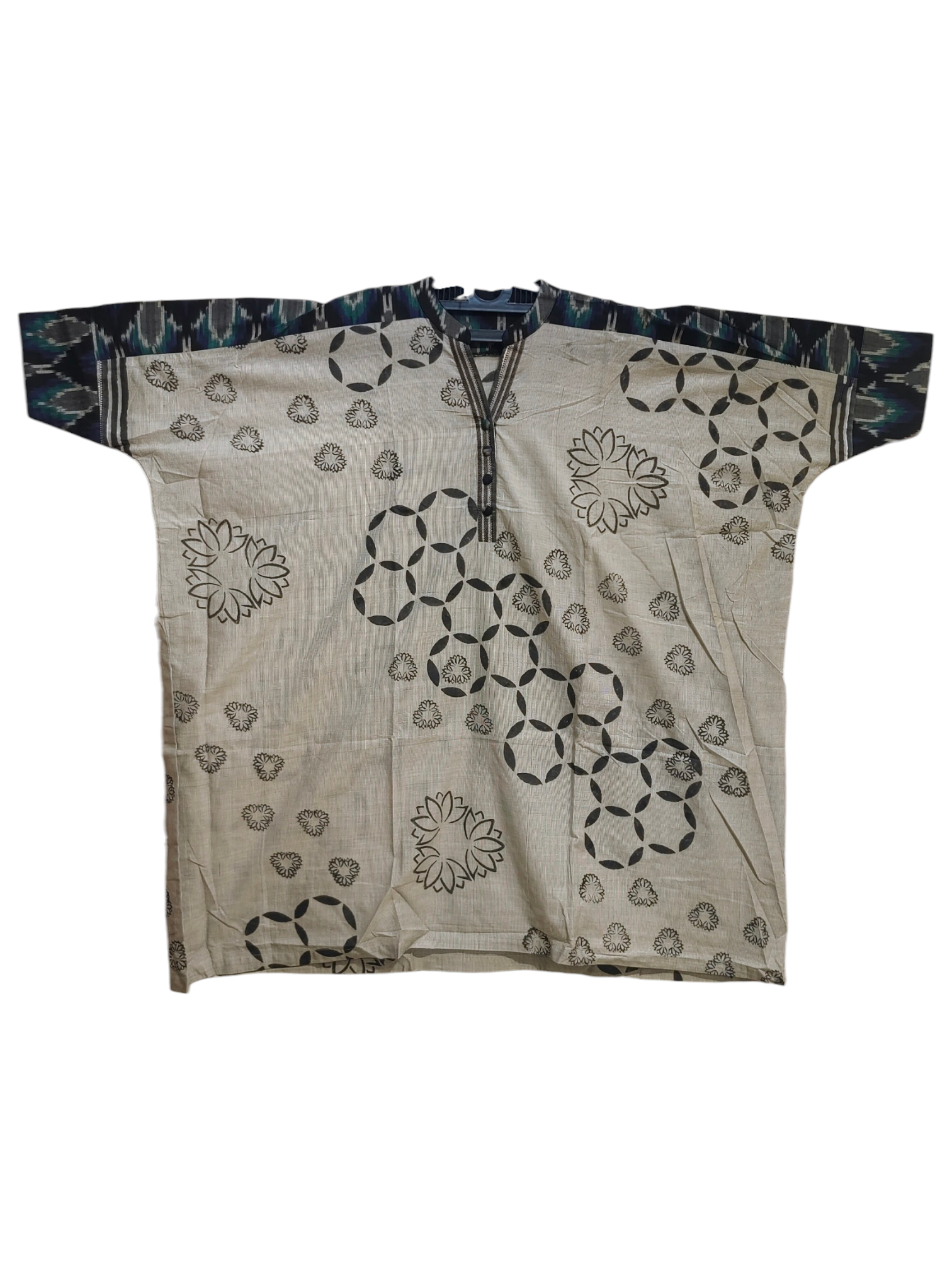 Traditional garment with geometric patterns on a white background