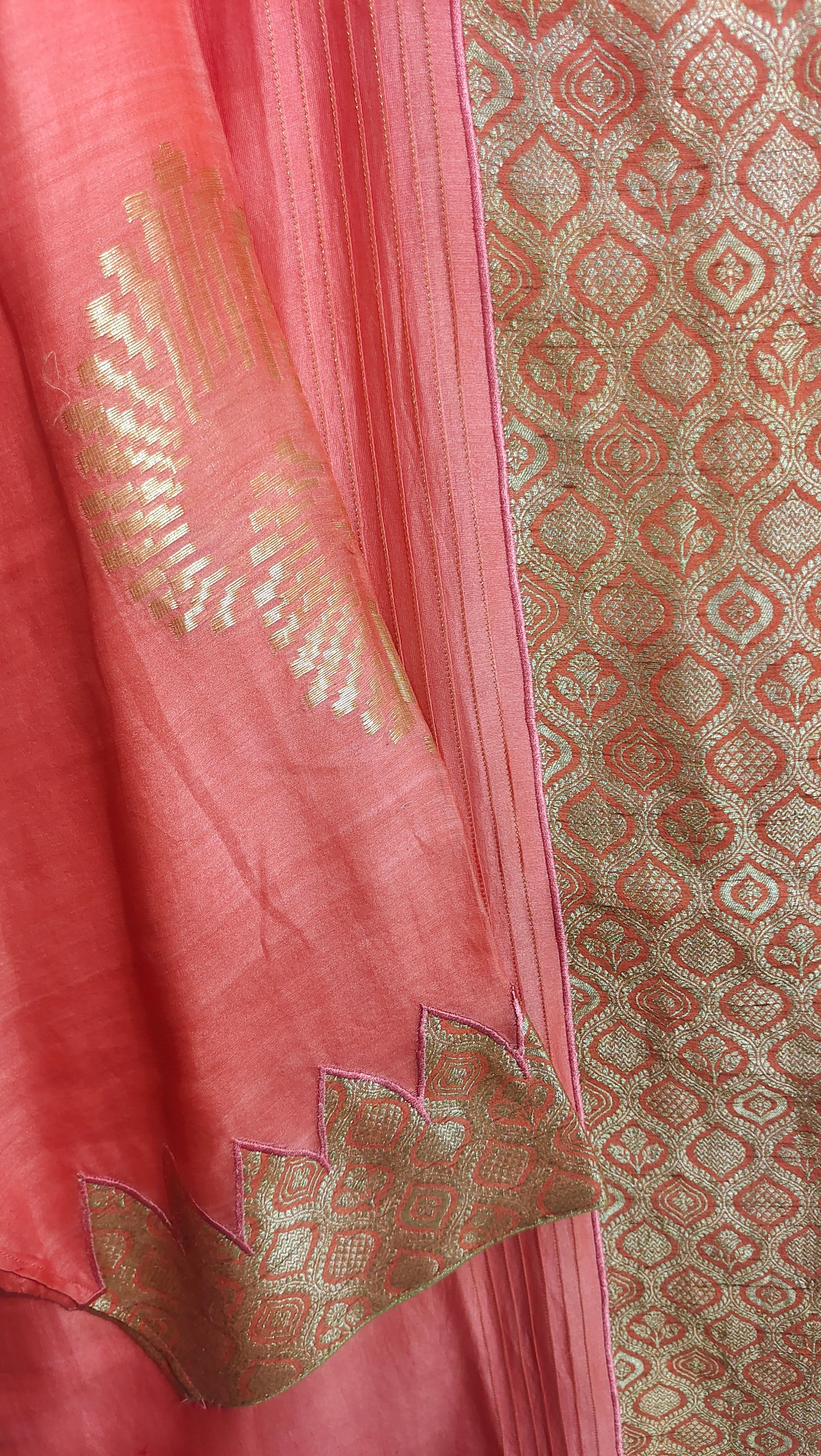 Peach fabric with gold embroidery